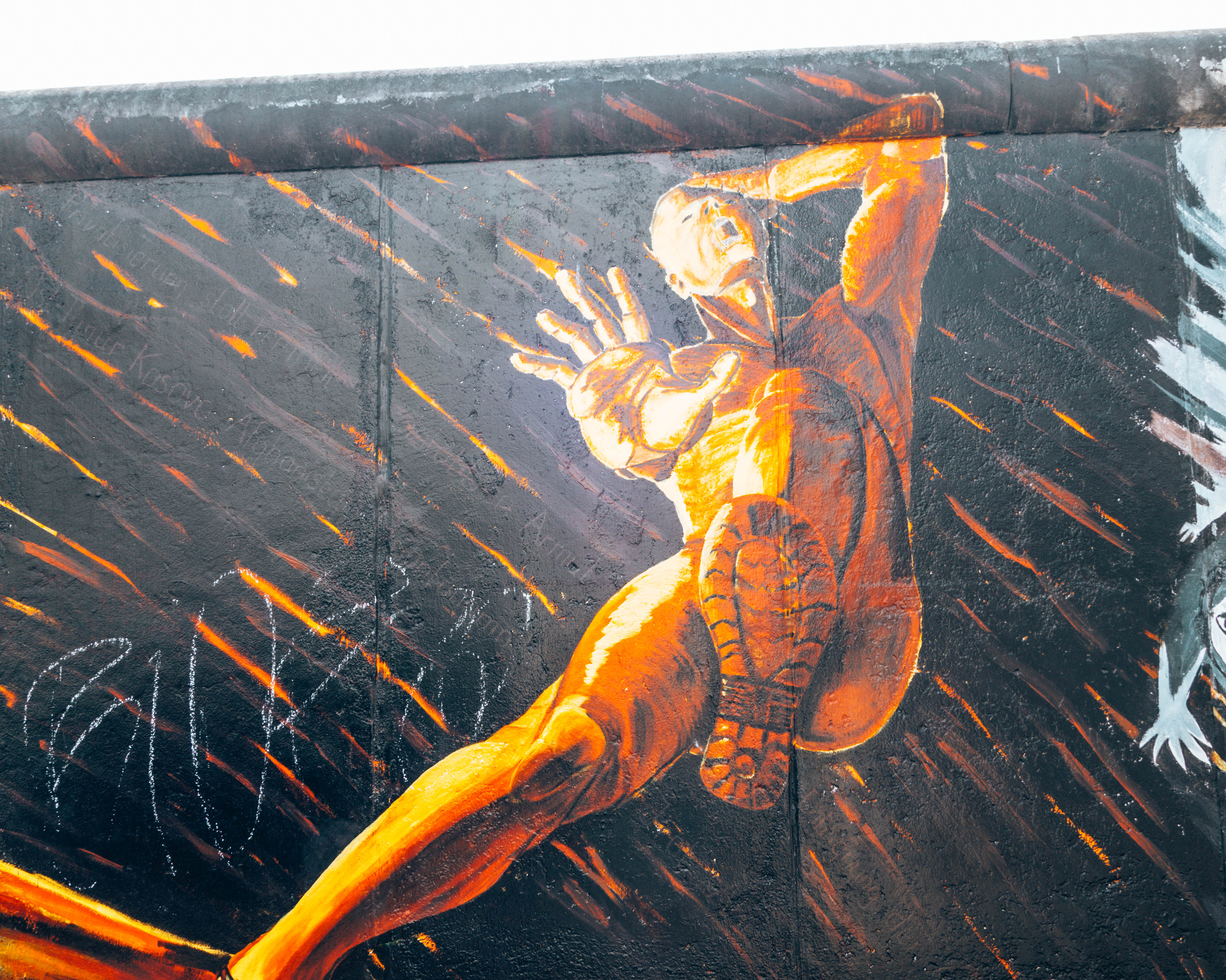 Man falling, Part of the East Side Gallery, street art museum in Berlin