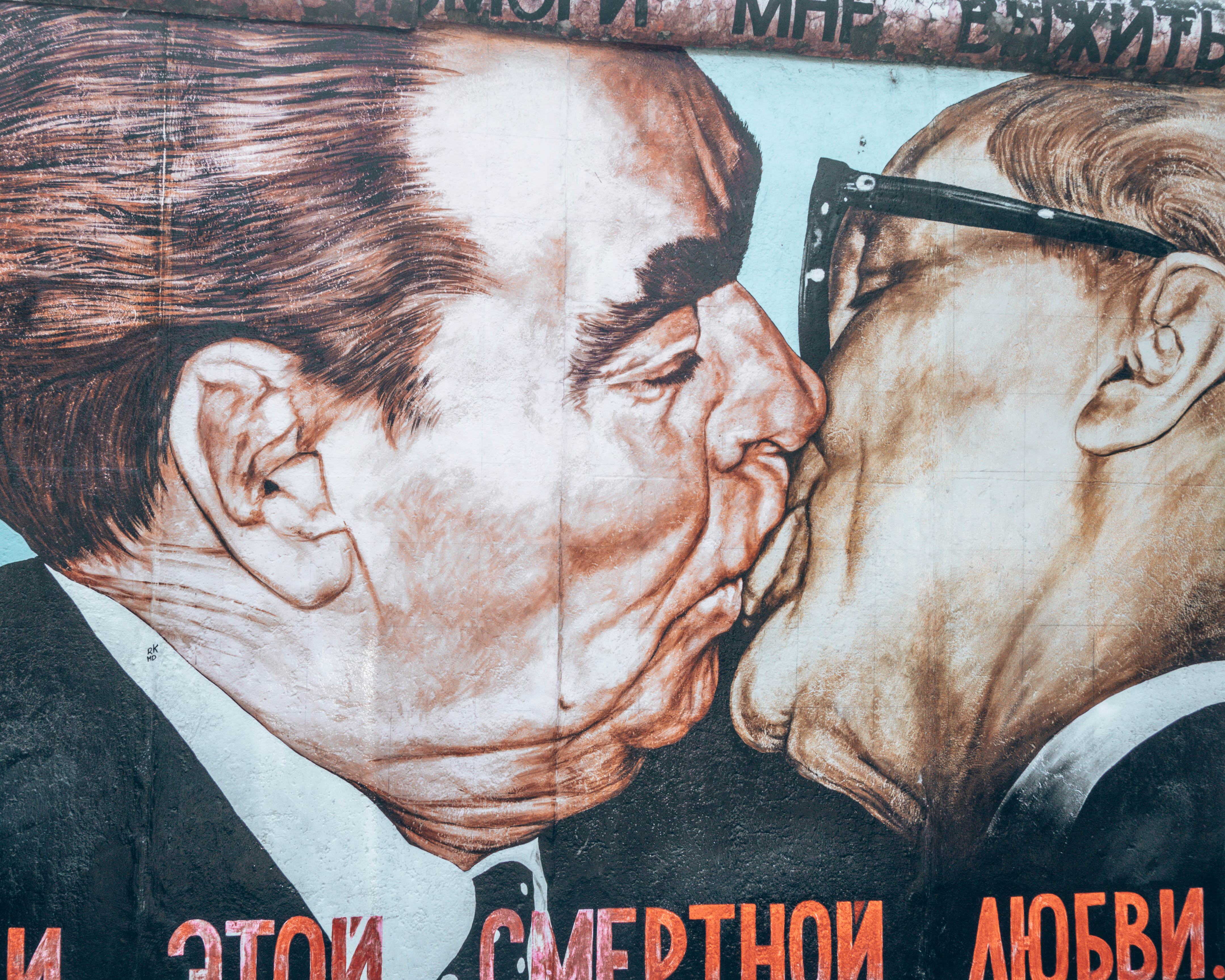 Fraternal kiss Part of the East Side Gallery, street art museum in Berlin