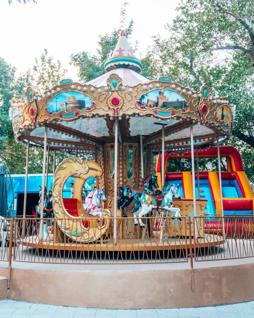 Childrens train station amusement park merry go round Yerevan Armenia