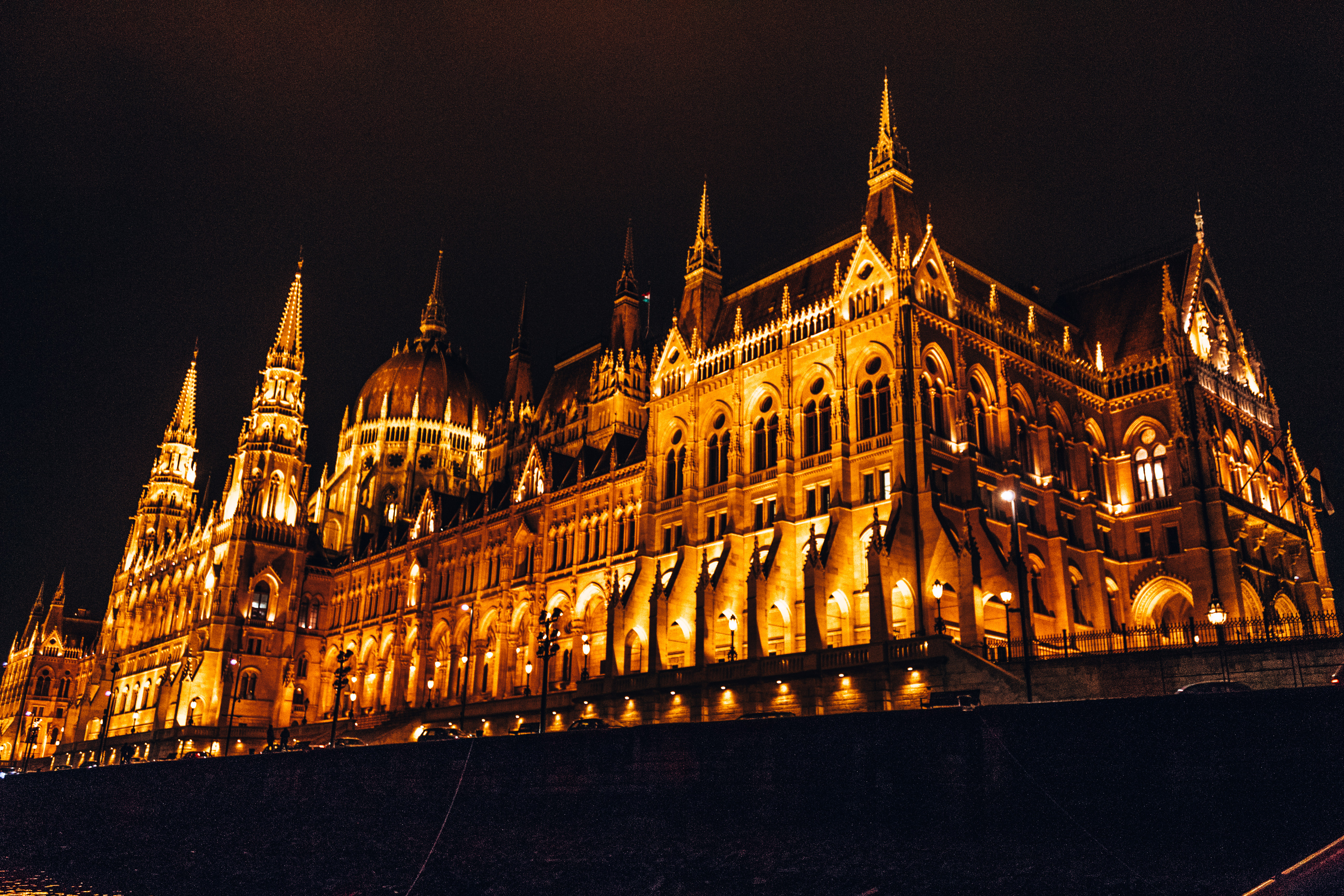 The Hungarian Parliament building all lit up at night in Budapest, Hungary