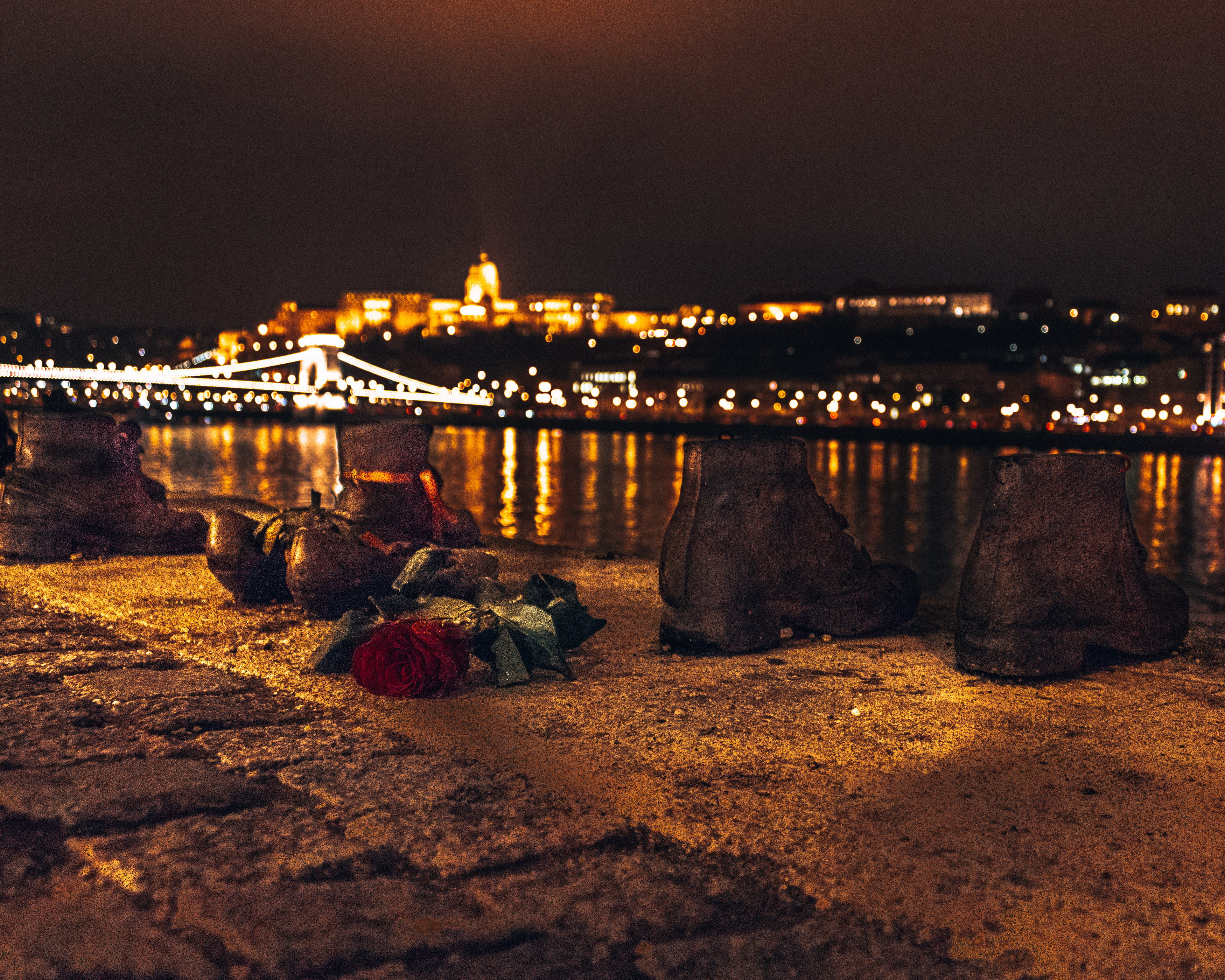 The famous Shoes on the Danube river at night in Budapest, Hungary