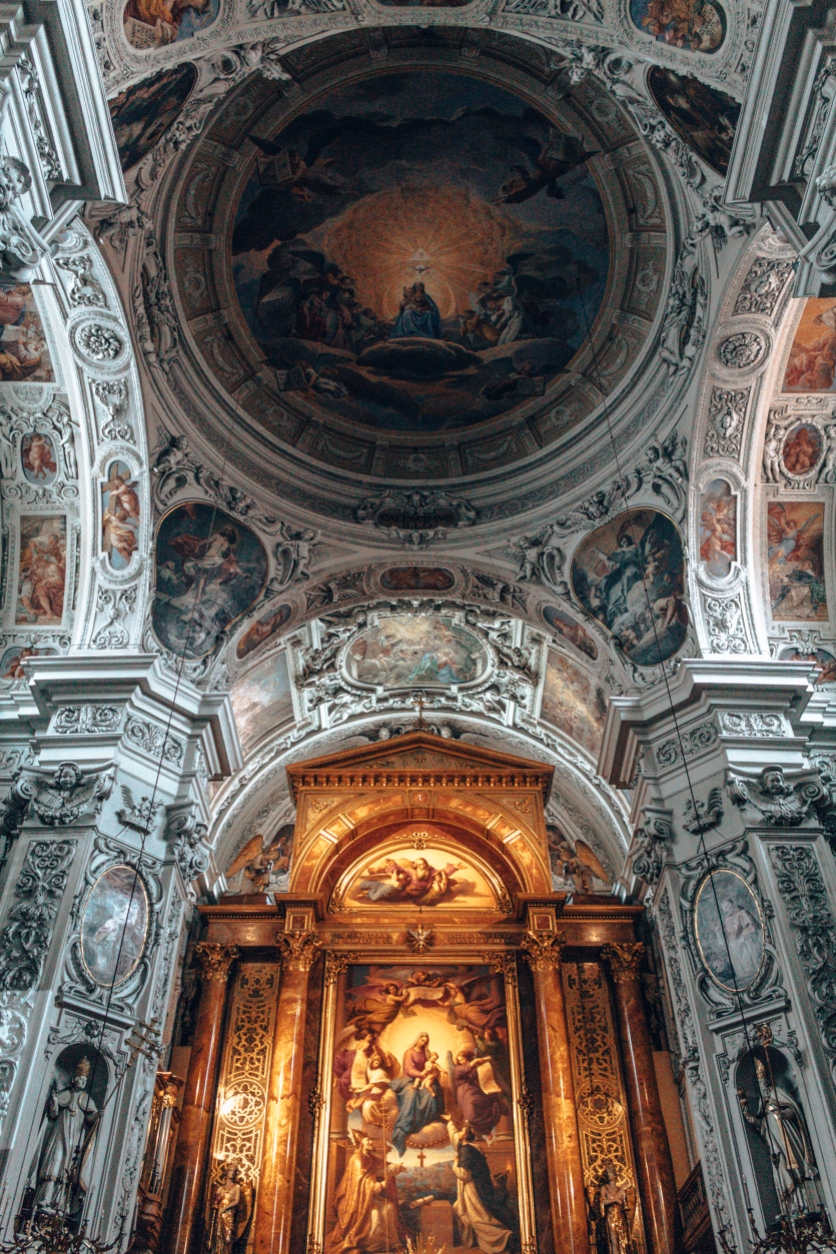 The domed ceiling of the Dominikaner Kirche IN Vienna, Austria