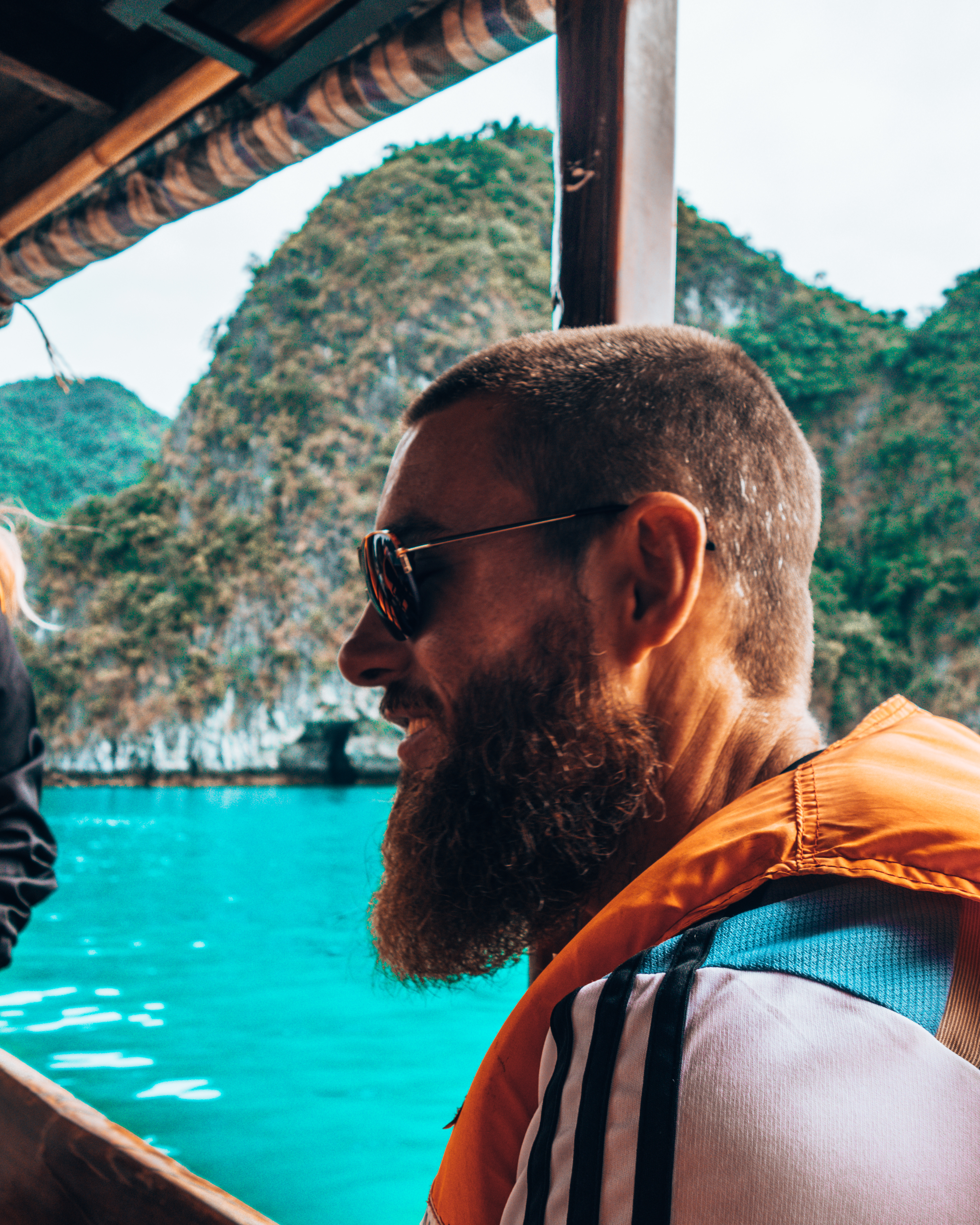 Derek riding a long boat in Halong Bay Vietnam